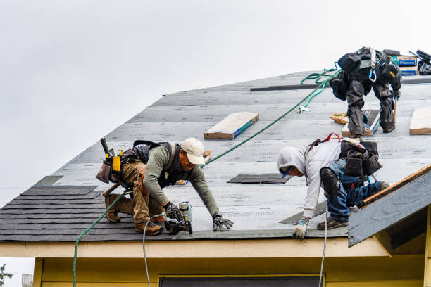 Professional Roof Replacement technician working in Marathon, FL
